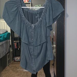 An off the shoulder shirt.